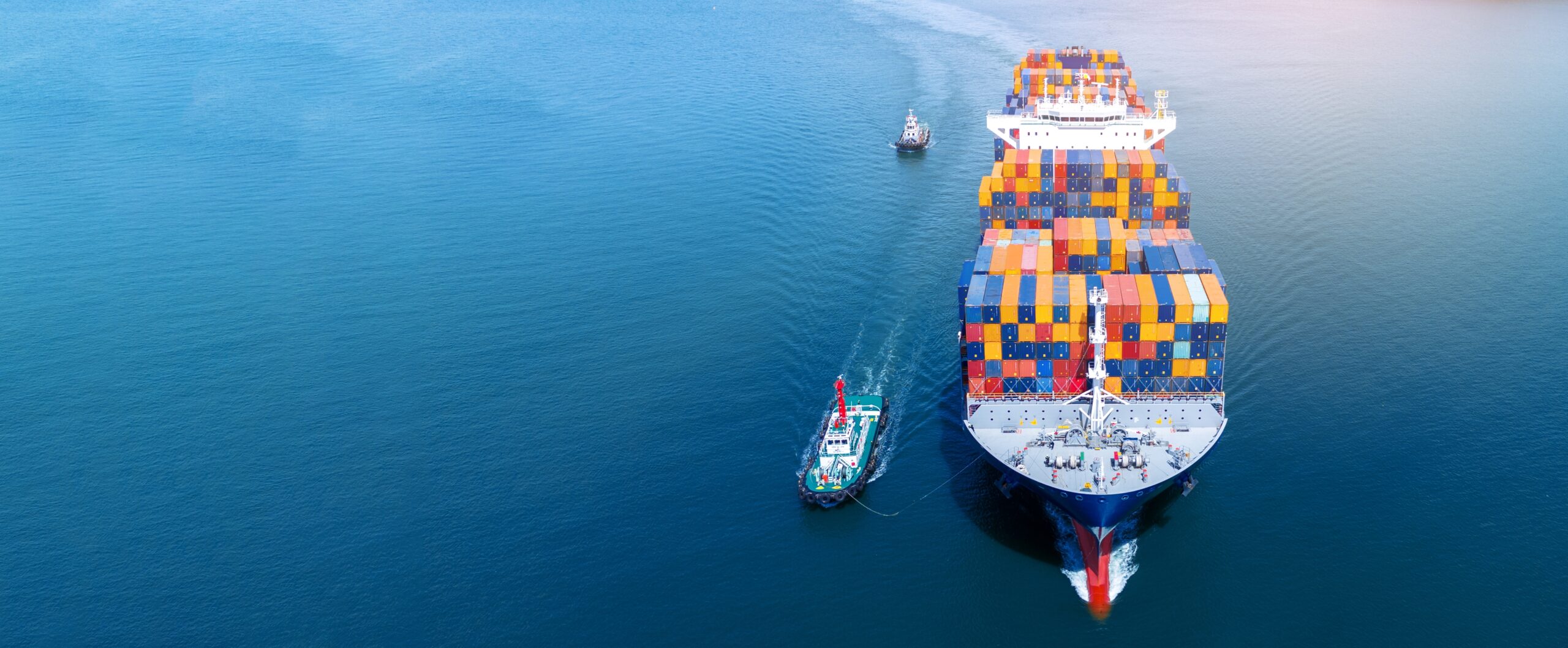 Front,View,Of,Cargo,Container,Ship,Carrying,Container,And,Running